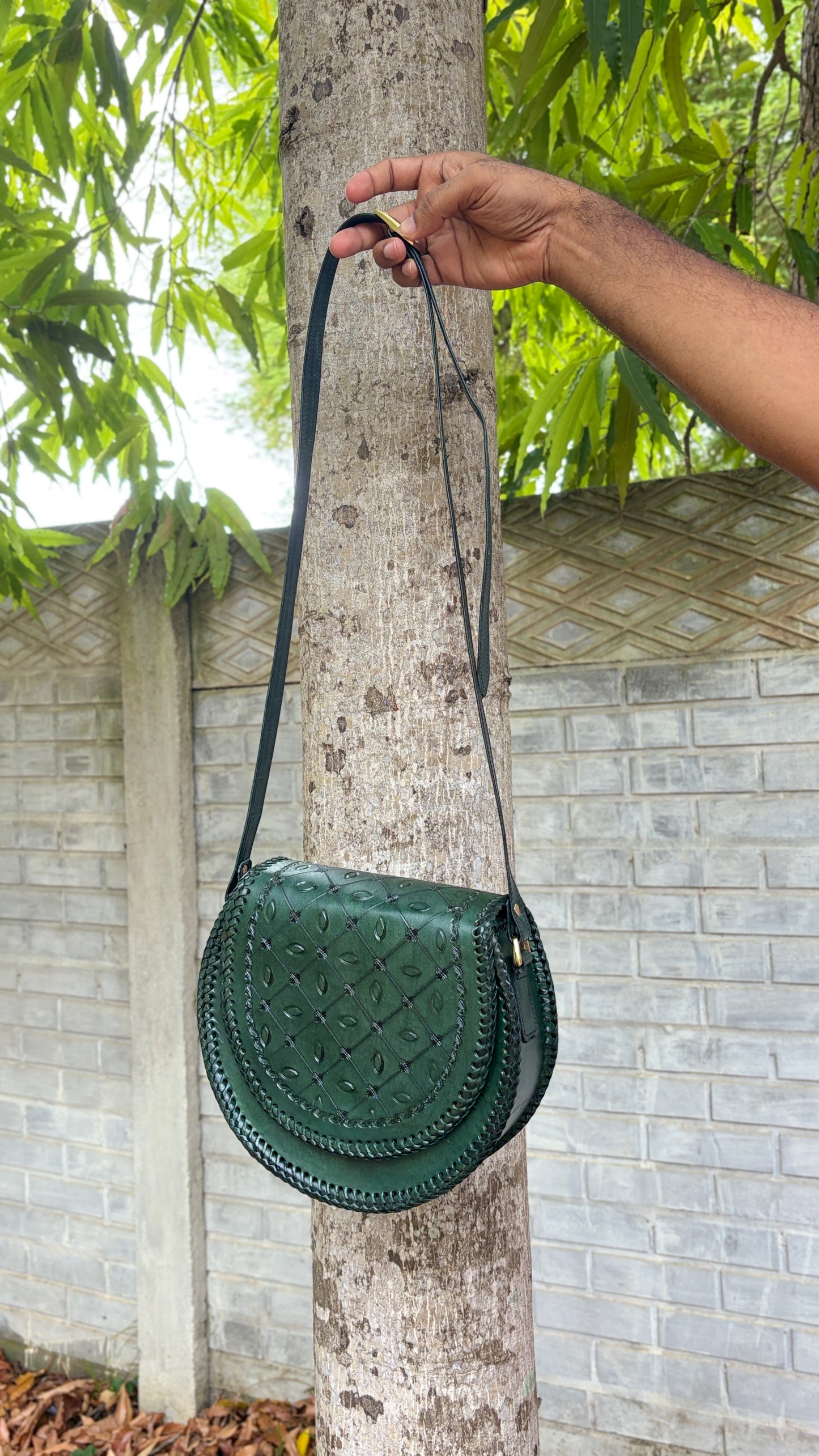 ZYGMA Handmade Genuine Leather Round Saddle Crossbody Bag | Forest Green | Diamond Eye Motif Embossed Flap | Braided Whipstitch Edge