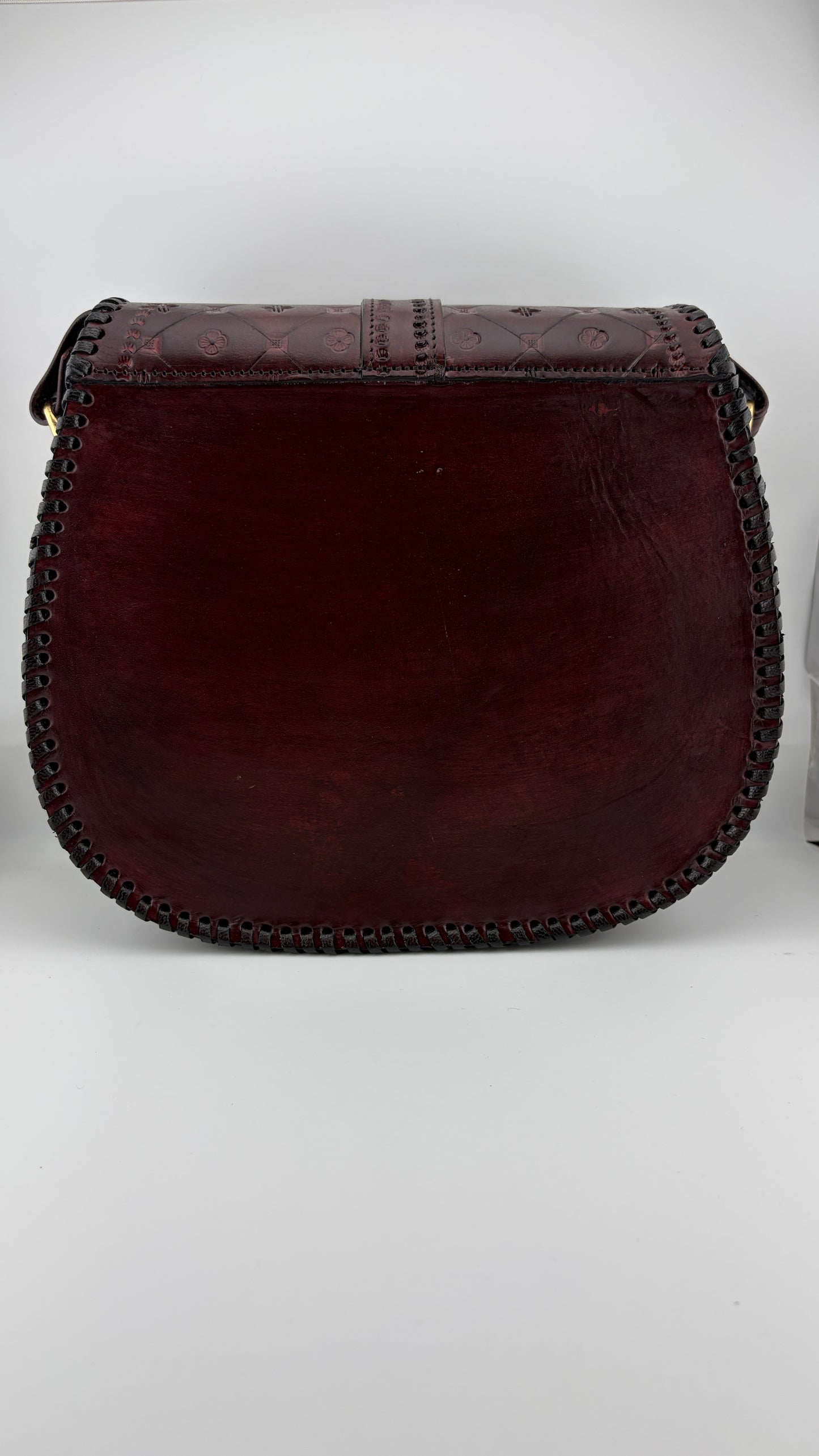 ZYGMA Handmade Genuine Leather Round Saddle Crossbody Bag | deep brown | Diamond Clover Embossed Flap | Whipstitch Edge | Top Handle + Crossbody Strap