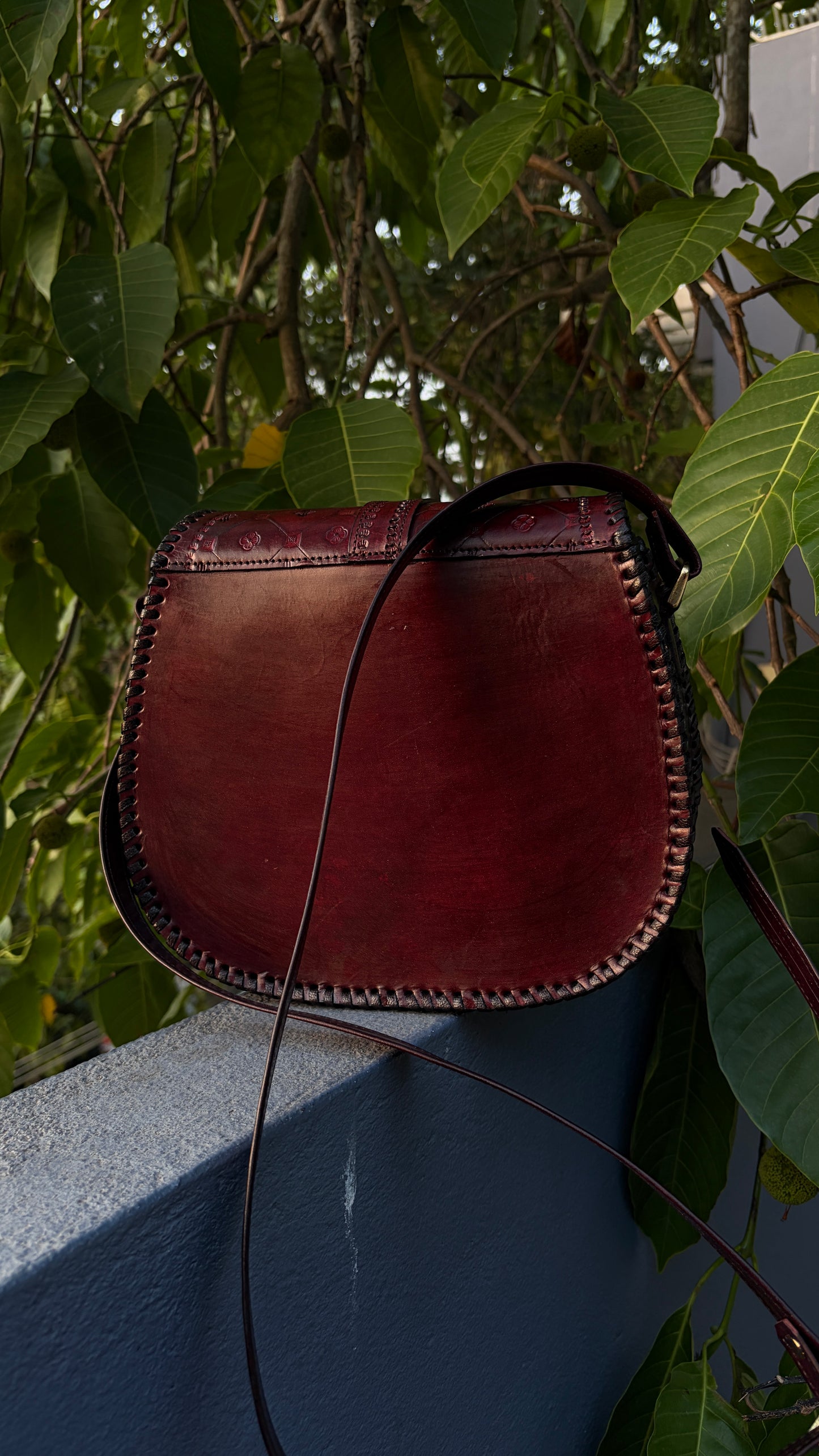 ZYGMA Handmade Genuine Leather Round Saddle Crossbody Bag | deep brown | Diamond Clover Embossed Flap | Whipstitch Edge | Top Handle + Crossbody Strap