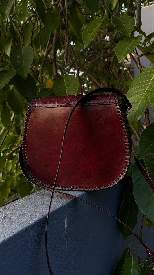 ZYGMA Handmade Genuine Leather Round Saddle Crossbody Bag | deep brown | Diamond Clover Embossed Flap | Whipstitch Edge | Top Handle + Crossbody Strap