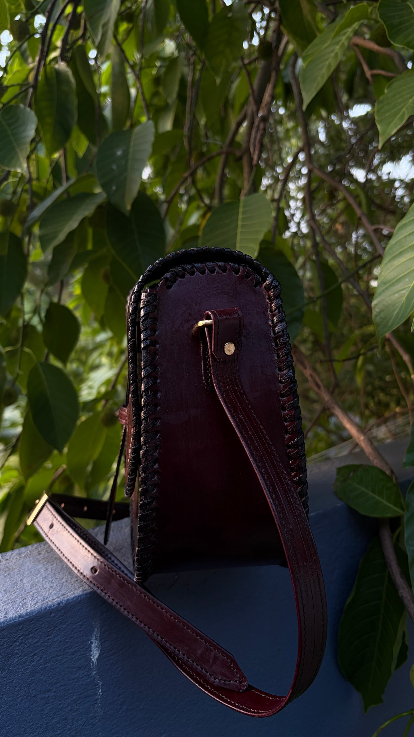 ZYGMA Handmade Genuine Leather Round Saddle Crossbody Bag | deep brown | Diamond Clover Embossed Flap | Whipstitch Edge | Top Handle + Crossbody Strap