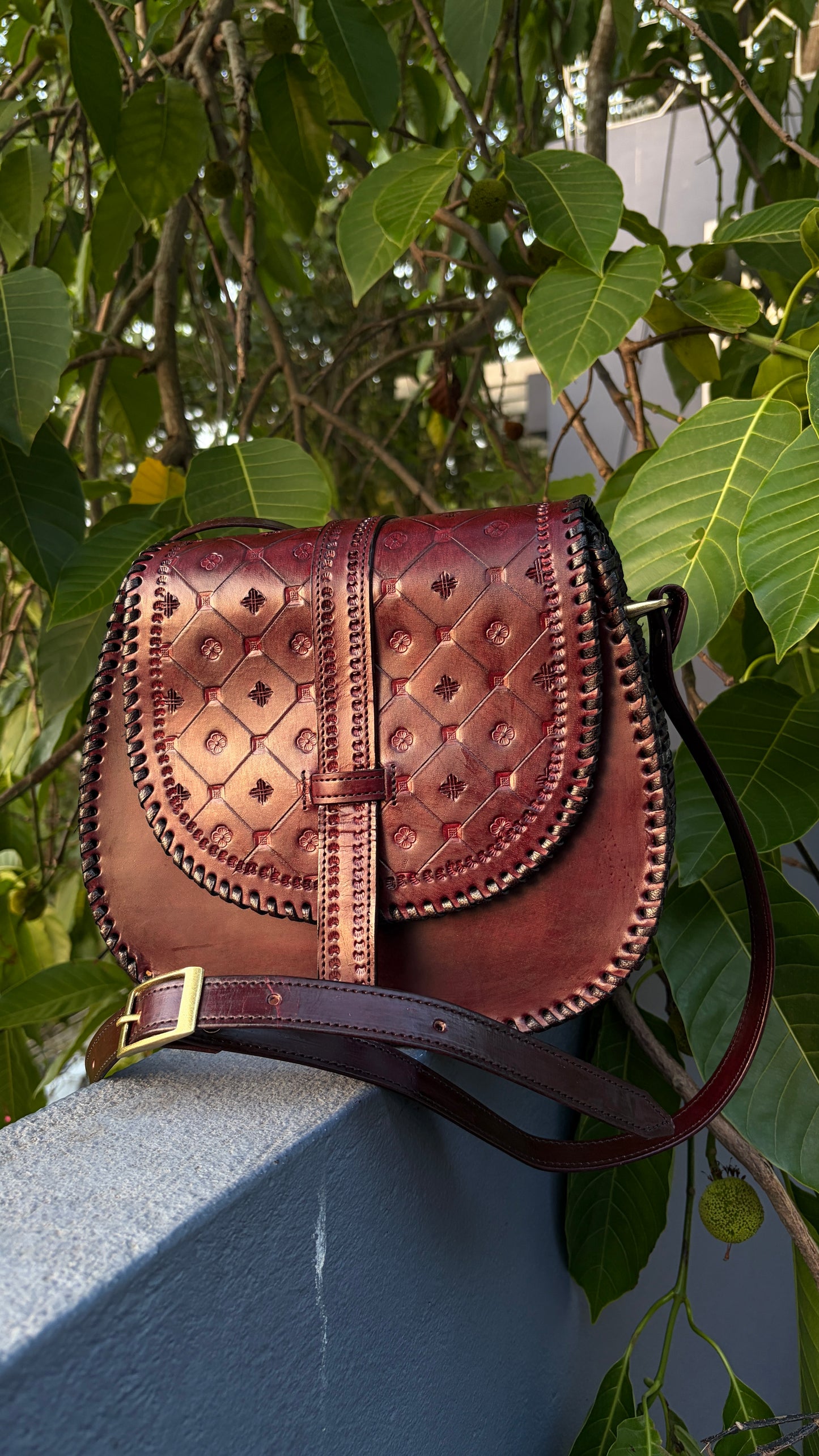 ZYGMA Handmade Genuine Leather Round Saddle Crossbody Bag | deep brown | Diamond Clover Embossed Flap | Whipstitch Edge | Top Handle + Crossbody Strap