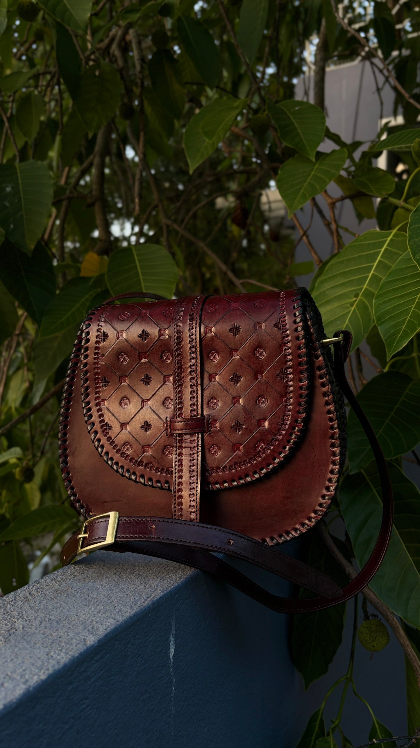 ZYGMA Handmade Genuine Leather Round Saddle Crossbody Bag | deep brown | Diamond Clover Embossed Flap | Whipstitch Edge | Top Handle + Crossbody Strap