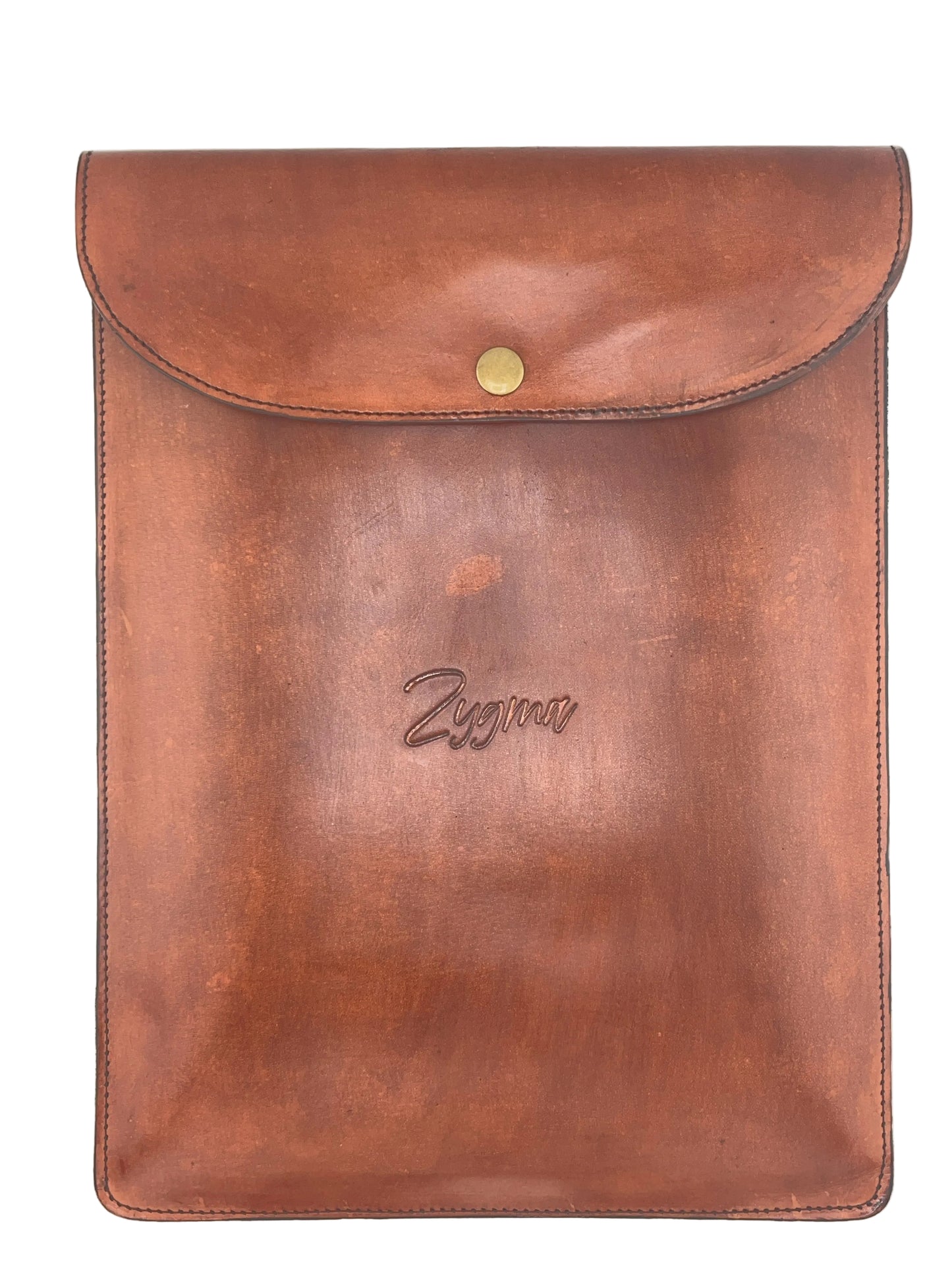 A brown leather sleeve or pouch with a flap closure and a small gold-tone snap button, photographed flat against a light neutral background. The word 'Zyona' is embossed near the center.