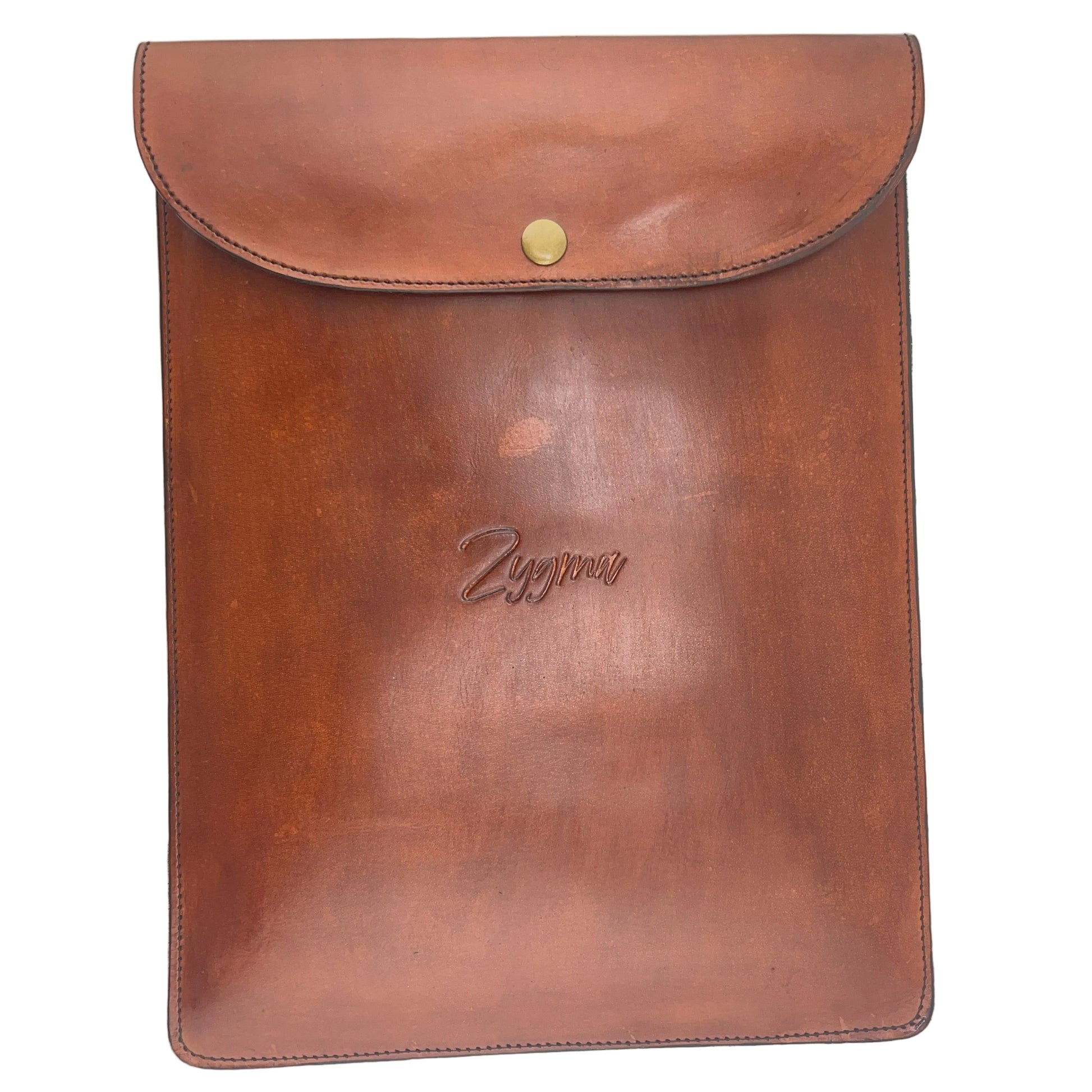 A brown leather sleeve or folio with a curved flap closure and a small gold snap button, photographed against a plain light background. An embossed script logo is visible near the center.