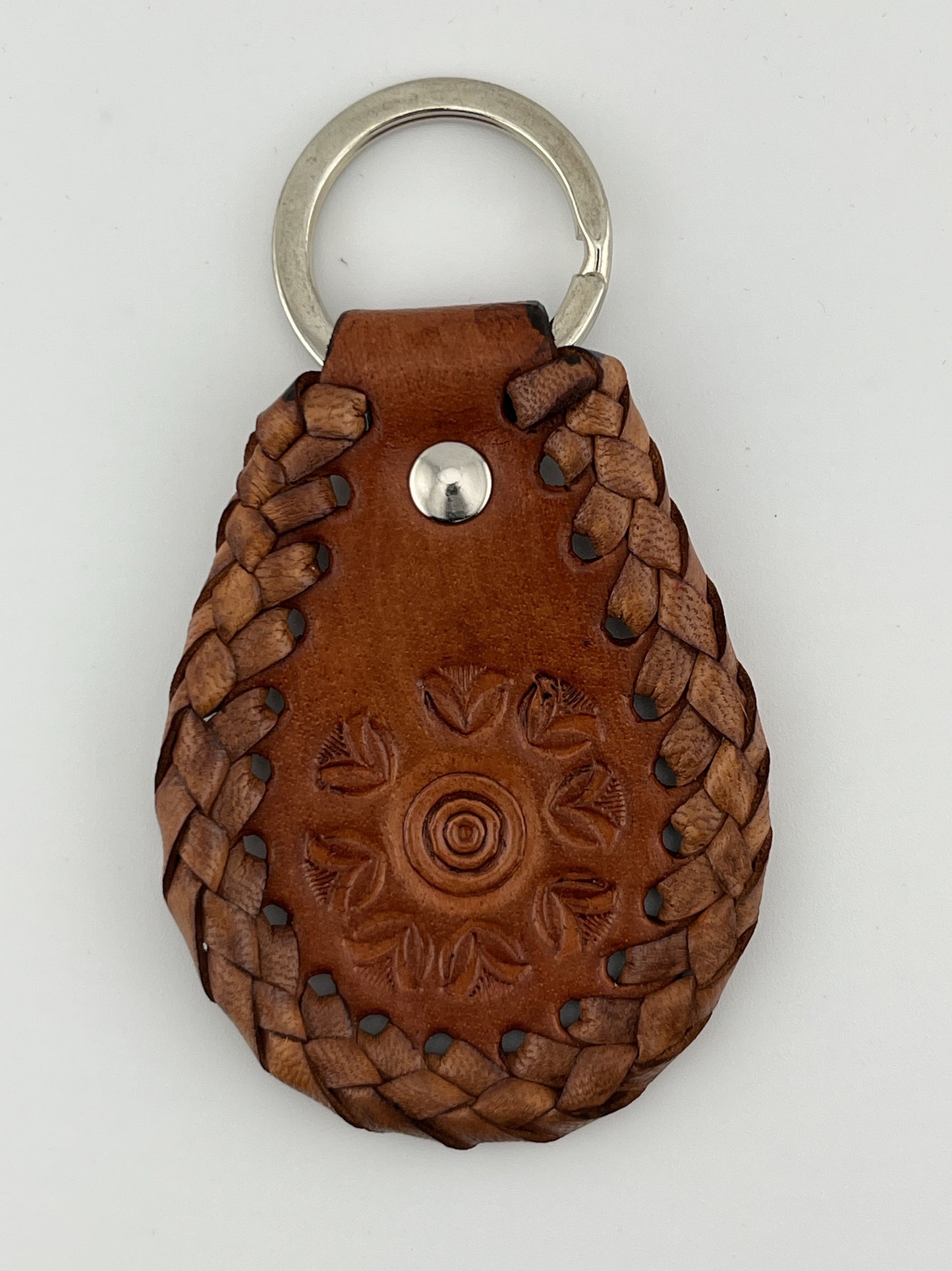 ZYGMA Handcrafted Braided Leather Keychain | Hand-Tooled Floral Embossed Teardrop with Woven Edge