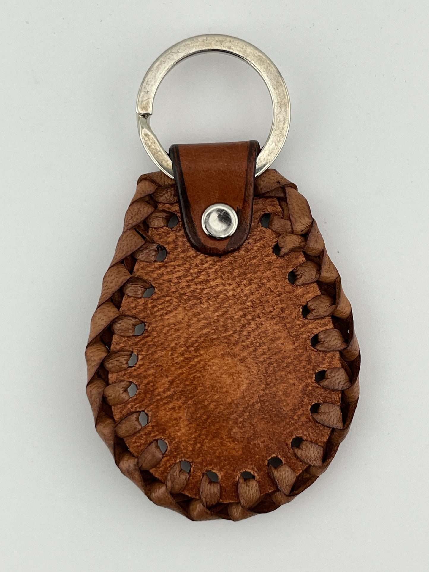 ZYGMA Handcrafted Braided Leather Keychain | Hand-Tooled Floral Embossed Teardrop with Woven Edge