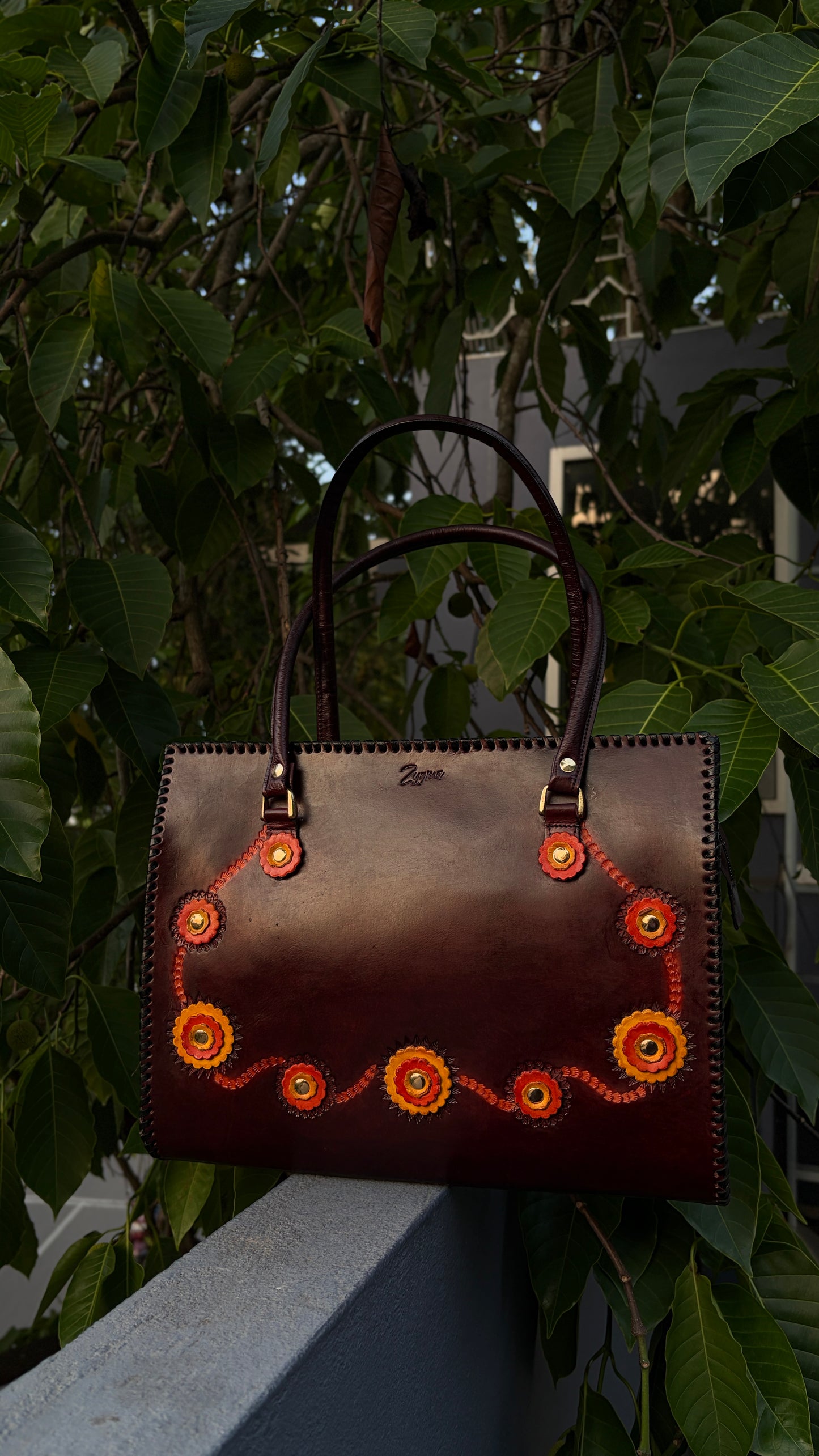 ZYGMA 14-Inch Handmade Genuine Leather Laptop Tote Bag | Deep Burgundy | 3D Hand-Applied Leather Flower Appliqué | Orange & Yellow Florals | Gold Stud Detail