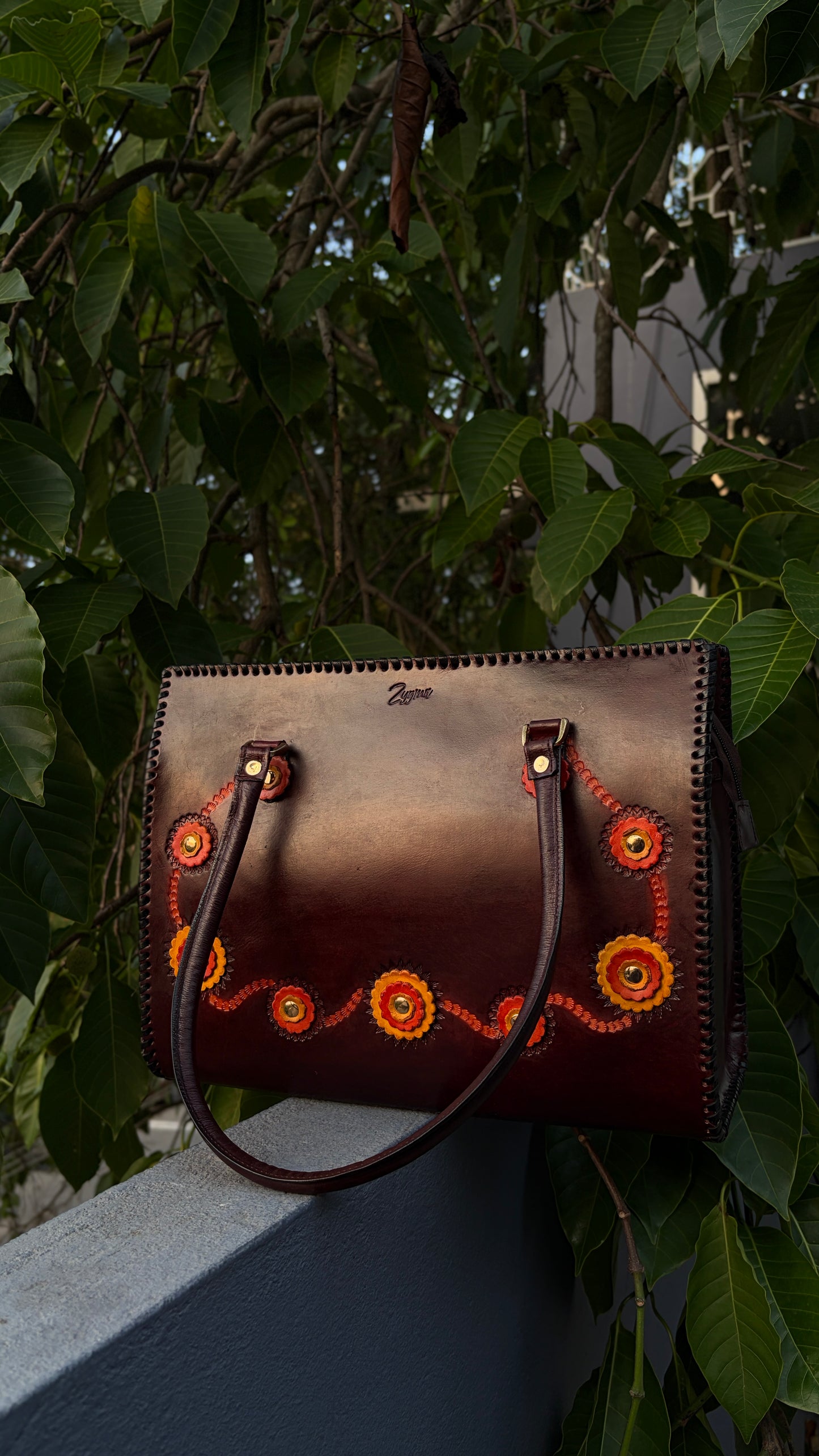 ZYGMA 14-Inch Handmade Genuine Leather Laptop Tote Bag | Deep Burgundy | 3D Hand-Applied Leather Flower Appliqué | Orange & Yellow Florals | Gold Stud Detail