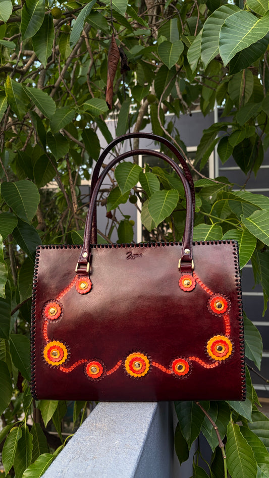 ZYGMA 14-Inch Handmade Genuine Leather Laptop Tote Bag | Deep Burgundy | 3D Hand-Applied Leather Flower Appliqué | Orange & Yellow Florals | Gold Stud Detail