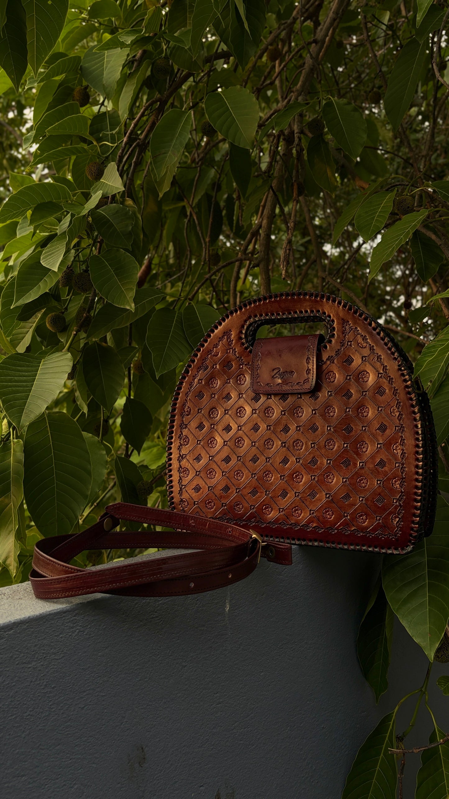 Zygma Embossed Dome Handbag — Genuine Leather