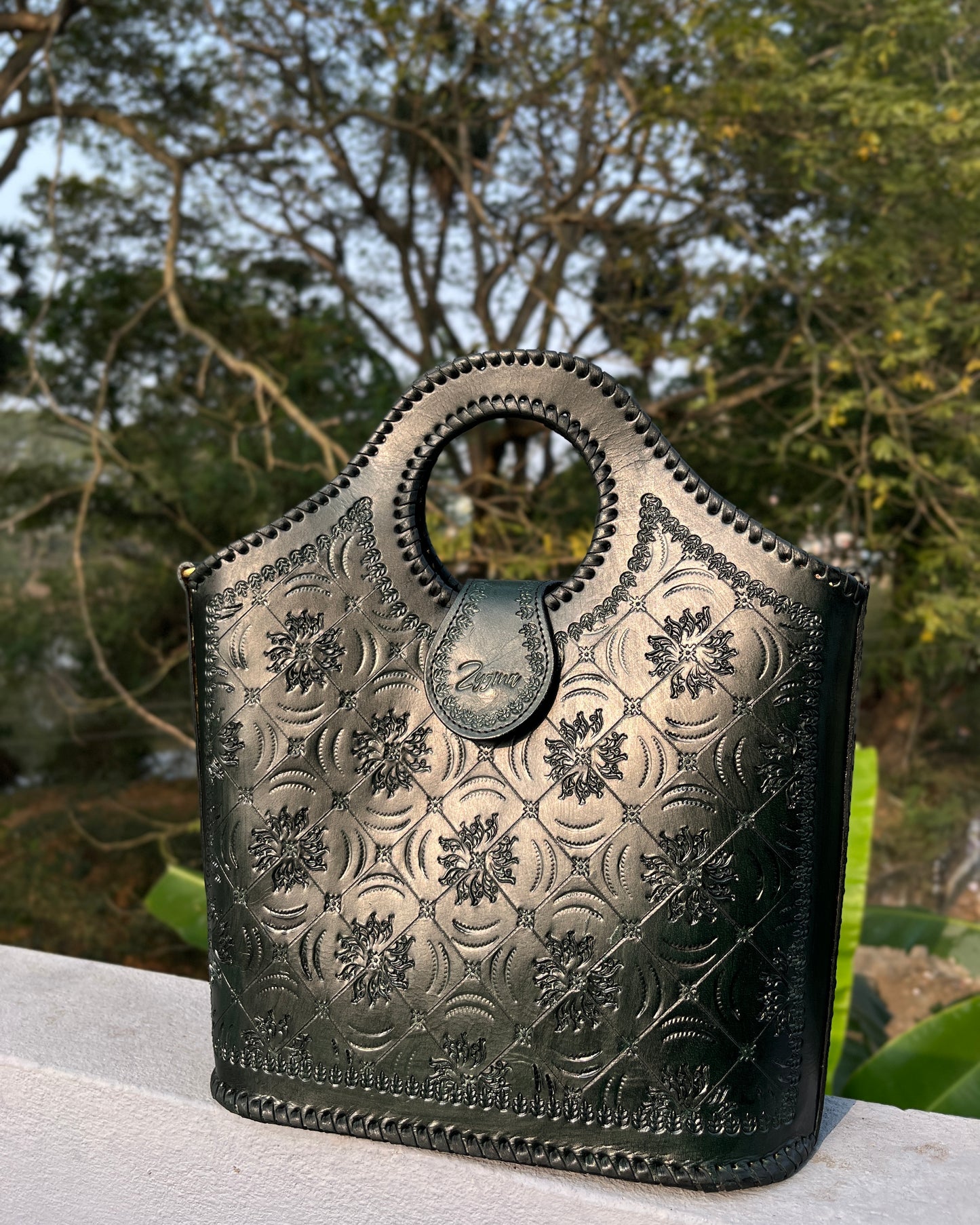 Zygma Handmade Genuine Leather Handbag for Women | Hand-Stamped Floral Tote | Circular Whipstitch Handle | Medium Structured Bag | Crossbody Strap | Black & Green | Artisan Ethnic Boho Purse