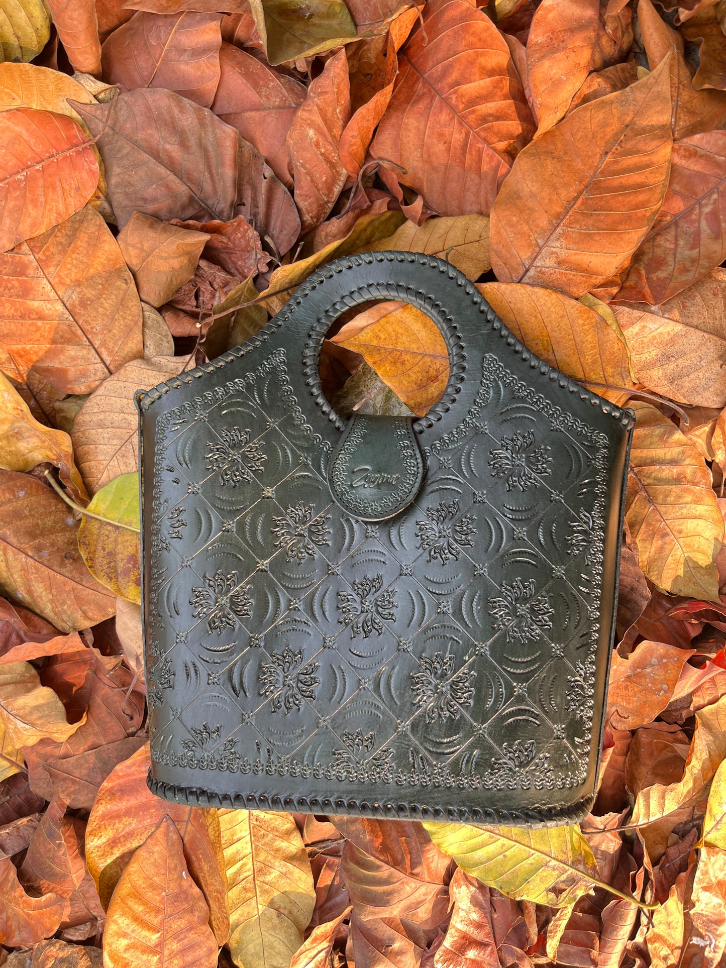 Zygma Handmade Genuine Leather Handbag for Women | Hand-Stamped Floral Tote | Circular Whipstitch Handle | Medium Structured Bag | Crossbody Strap | Black & Green | Artisan Ethnic Boho Purse