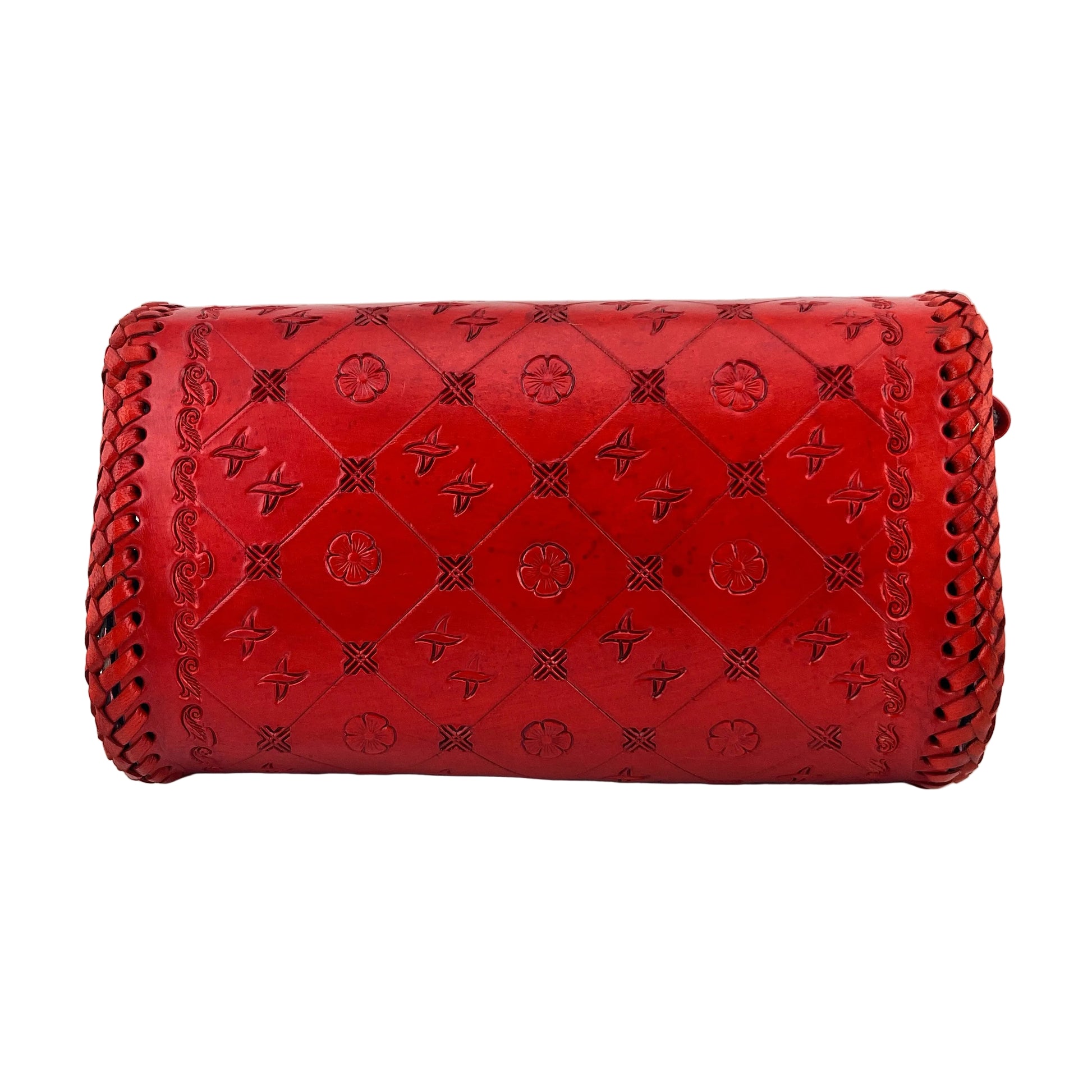 Red handbag with a woven pattern on a white background