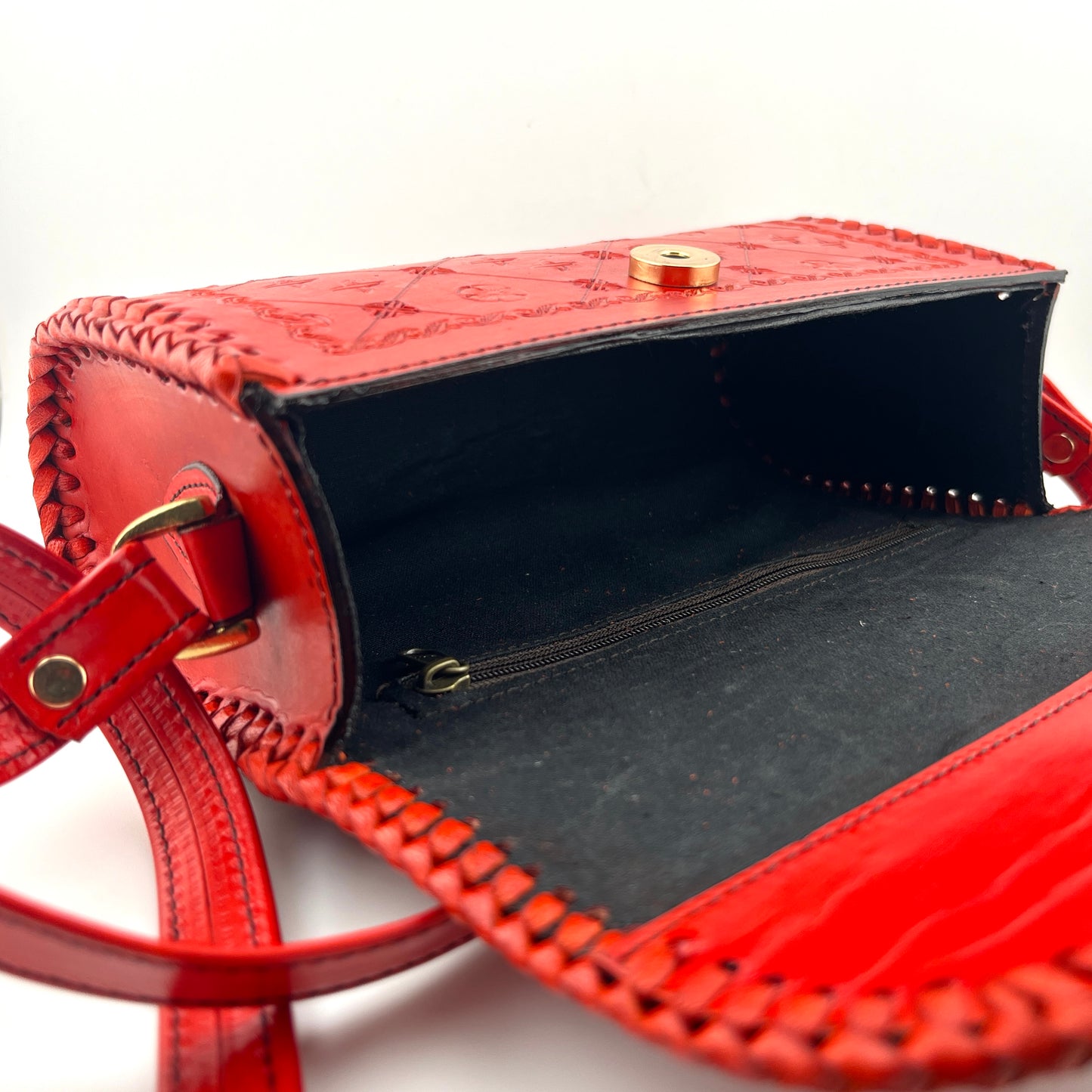 Zygma Red Embossed Leather sling bag