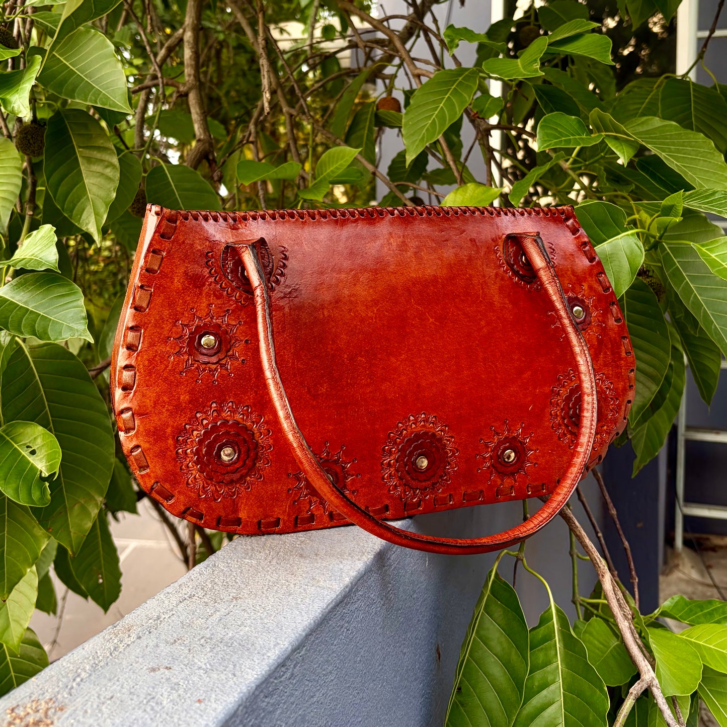 Zygma Hand-Carved Rosette Half-Moon Handbag — Cognac Tan