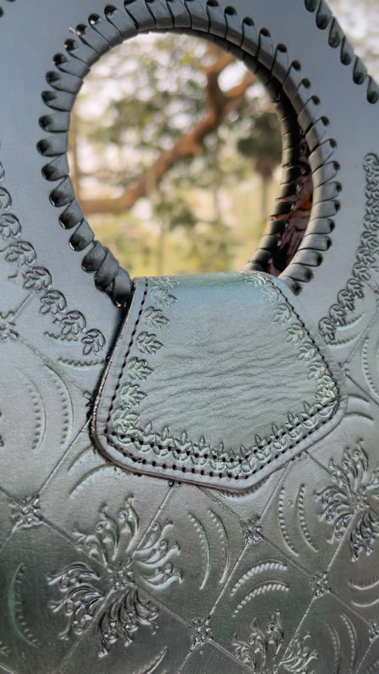 Zygma Handmade Genuine Leather Handbag for Women | Hand-Stamped Floral Tote | Circular Whipstitch Handle | Medium Structured Bag | Crossbody Strap | Black & Green | Artisan Ethnic Boho Purse